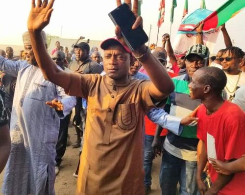The house of representative candidate for Abuja south Alhaji Abdulrahman Ajiya acknowledged cheers from APC supporters during campaign tour to Ashara ward on Tuesday