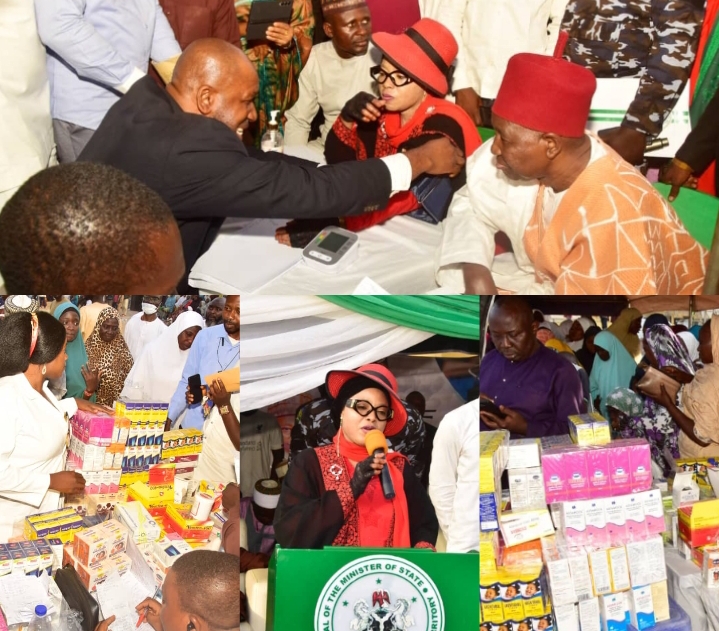Chief of Karshi, Alhaji Ismail Dalandi Mohammed and the FCT Minister of State, Dr. Ramatu Tijjani Aliyu in consultation with a medical personnel during the outreach programme held in Karshi, Abuja