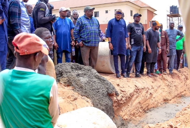 FCT commissioner for public complaints Commission Mr Ezikel Dalhatu Musa with Senator Phillip Aduda representing the FCT, during inspection of the road projects in Bwari area council on Friday.