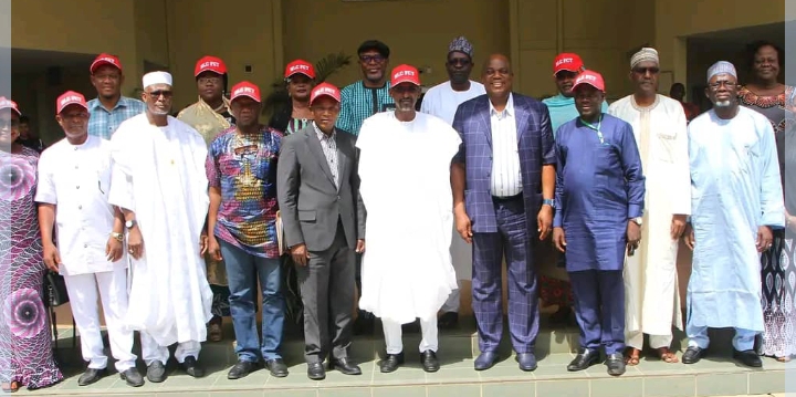 FCT minister, Muhammad Musa Bello (m) in a group photograph with the newly elected executives of the FCT chapter of NLC, led by its chairman, Comrade Stephen Knabayi in Abuja last Thursday.