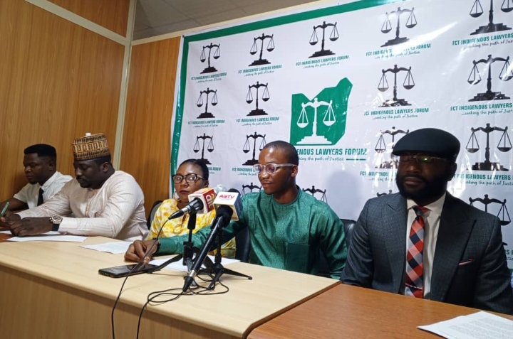 Chairman of the FCT indigenous lawyers forum, Atna Kuyembo, (m) address press conference in Abuja on Saturday