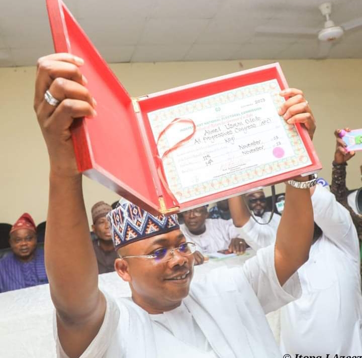 Alhaji Ododo Ahmed Usman displaying his certificate of return