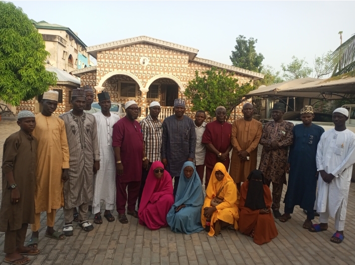 Executive Chairman, Kogi State Civil Service Boss, Barrister Muhammed Tanko Osuku (M) in a group photograph with Kogi LG Qur'anic Recitation Competition contingent and coordinators shortly after meeting with Barr. Tanko at his Lokoja residence on Wednesday