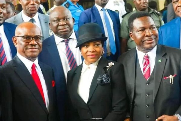 Wife of FCT Minister, Hon. Justice Eberechi Suzzette (M), FCT Minister, Nyesom Wike (L) and other