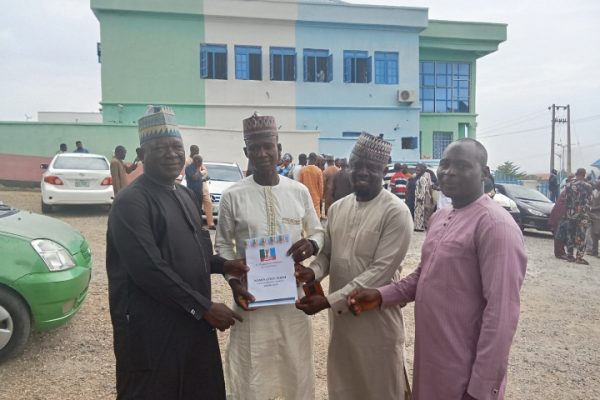 Caretaker Committee Chairman of Kogi LGC, Hon Musa Abdulmalik in a group photograph with APC stakeholders from Kogi LG shortly after obtaining his nomination forms at the State party secretariat Lokoja, Kogi State capital on Tuesday