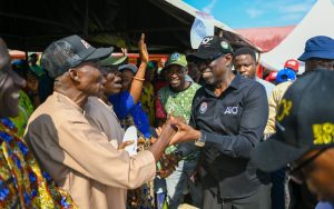 Dr Asue Ighodalo exchanging pleasantry with Edo people