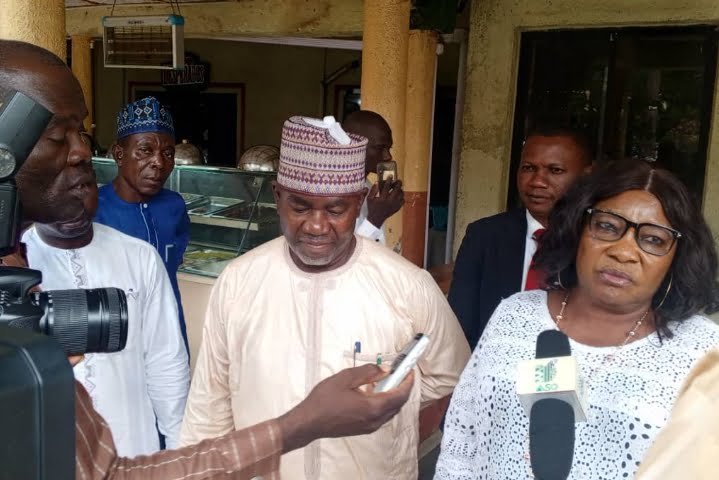 FCT FADAMA -CARES coordinator Usman Adangara with the representative of the mandate secretary for Agriculture And Rural Development Secretariat, Mrs Grace Adayilo during a one day training for beneficiaries in Gwagwalada on Tuesday.