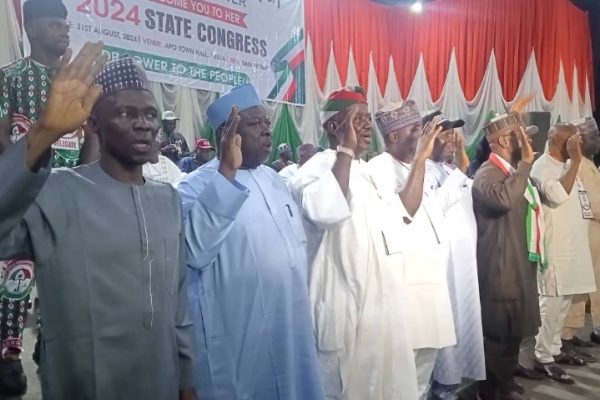 The new FCT PDP state chairman, Alhaji Muhammed Ismaila Dogara alongside other executives take their oath of office after their affirmation in Abuja on Saturday.