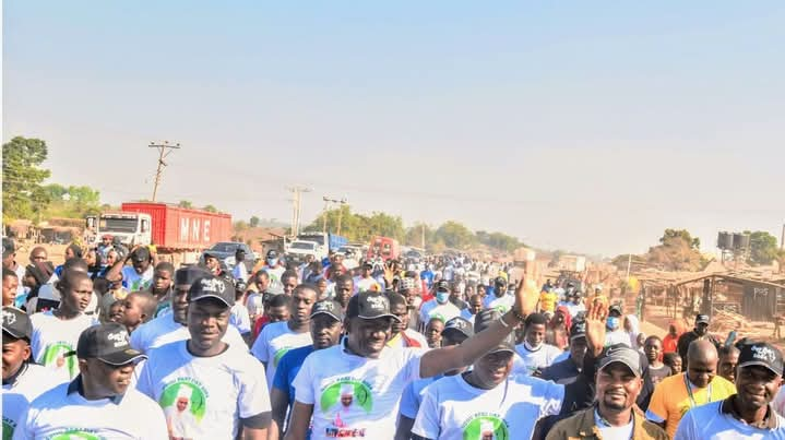 Kogi state Commissioner of Solid Minerals and natural resources, Engr. Mohammed Abubakir Bashir Gegu leading Gegu people on a road walk