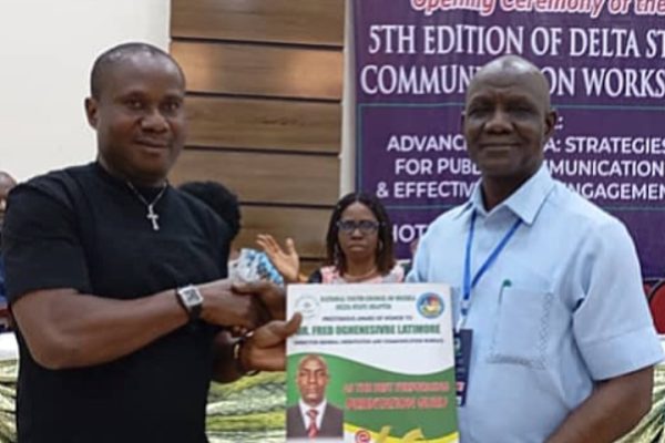 Delta State Chairman of the National Youth Council of Nigeria, Comrade Kenneth l Okorie (L) and Communication Strategist and Director General of the Delta State Orientation and Communications Bureau, Dr Wilfred Latimore Oghenesivbe (R)