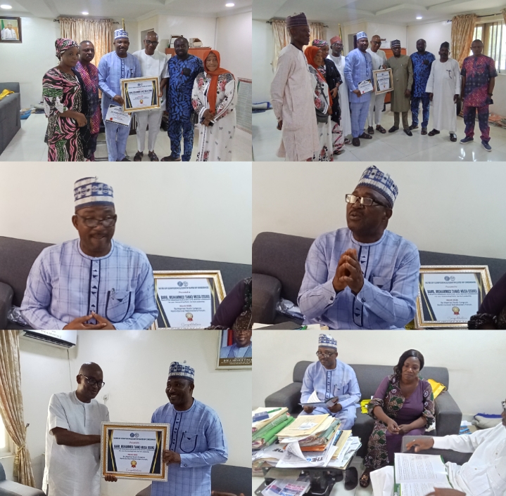 Hon. Barr. Muhammed Tanko Musa (Osuku), the Executive Chairman of Kogi State Civil Service Commission receiving award for his remarkable congratulations to development of Kogi State