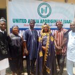 The leader of the United Abuja Aboriginals (UAA) Prince Hon Danlami John Kaura (m) in a group photograph with some key stakeholders during the maiden meeting of the indigenous natives of Abuja.