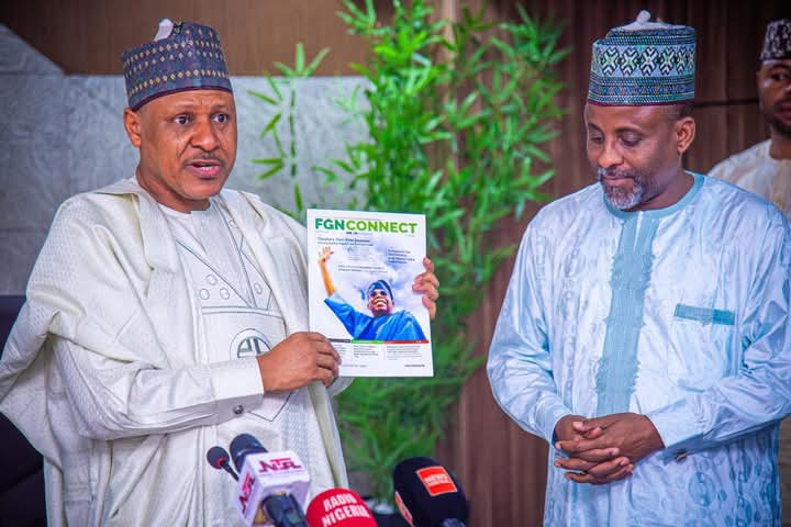 Minister of Information and National Orientation, Mohammed Idris and President of the Nigerian Union of Journalists, Alhaji Alhassan Yahaya