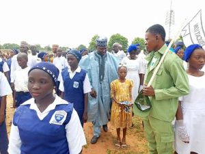 Pharm. Ahmed Baba Yahaya, Executive Chairman, Toto LGA exchanging pleasantry with Primary and nursery school pupils during children's day celebration