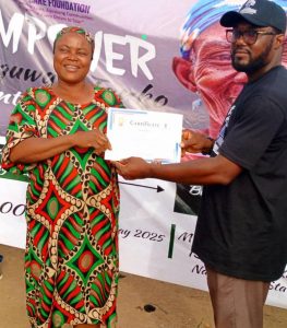 Another beneficiary receiving certificate of participation.