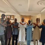 Hon. Barr. Muhammed Musa Tanko Osuku, Chairman Kogi State Civil Service Commission (m) in white, in a group photograph with delegation of former council officials and secretary in the State Civil Service Commission House Lokoja