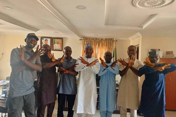 Former Kogi LG council officials from Zone B praise Barr. Tanko for inclusive, exceptional leadership Hon. Barr. Muhammed Musa Tanko Osuku, Chairman Kogi State Civil Service Commission (m) in white, in a group photograph with delegation of former council officials and secretary in the State Civil Service Commission House Lokoja
