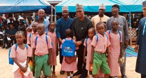 Agbawu Mek Agbawu with pupils of primary school during children's day celebration.
