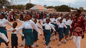 Agbawu Mek Agbawu with pupils of primary school during children's day celebration.