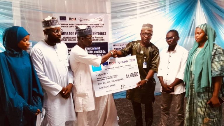 CCAPAD Director Ahmed Salihu with beneficiaries of the grants.