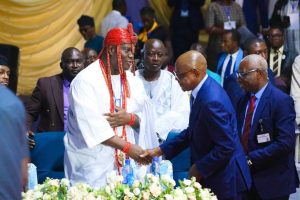 Royal Father of the Day, Ooni of Ife, Adeyeye Ogunwusi exchanging pleasantry with Minister of the Federal Capital Territory (FCT), Mr Nyesom Wike