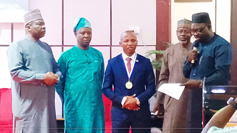 Akwaden with ICAN officials during the investiture at NSUK.