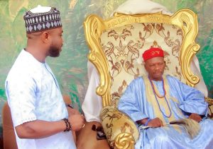 Special Adviser to the Executive Governor of Kogi State on Rural Development, Hon King Habib, addressing His Royal Highness, Dr. Ahmed Jimoh Eneji, the Obobanyi Ohionwa of Ihima at his palace.