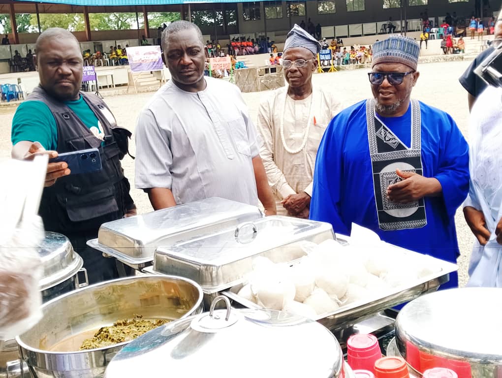 Dignitaries inspecting traditional dishes at festival of peace 2025.