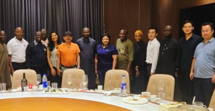 The DG NASWAMSA with Chinese business men during a dinner in his honour in Lagos.