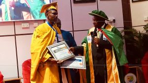 Dr. Bashir Shafa while receiving fellowship award by director research institute.