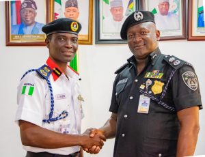 Commandant of the Nigeria Security and Civil Defence Corps (NSCDC), Aletan Olumide Ebenezer (L) and Commissioner of Police, Kogi State, CP Miller G. Dantawaye (R)