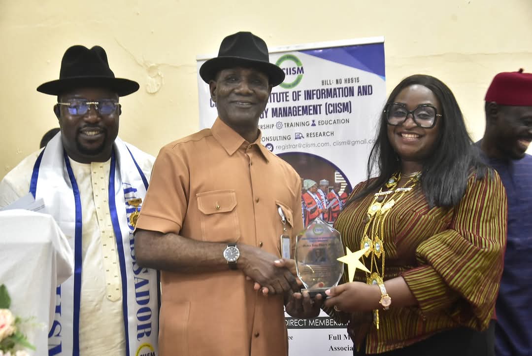 Photo News The President and Chairman Governing Council of the Chartered Institute of Information and Strategy Management (CIISM), Dr Mrs Temile Oritseweyinmi presenting the "CIISM Iconic Media Strategist Award" to the Director General, Delta State Bureau for Orientation and Communications, Dr Fred Latimore Oghenesivbe Esq (middle), at the closing ceremony of the 6th edition of the Delta State Strategic Communication Workshop tagged DELCOM 2025 on Wednesday 8th October in Asaba, while the Registrar of CIISM, Dr Adelanke Oyintoke (left) looks on in admiration.