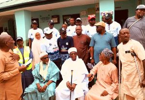 Wadada's aids with the representatives of the emir of Keffi during the first day of free medical outreach.