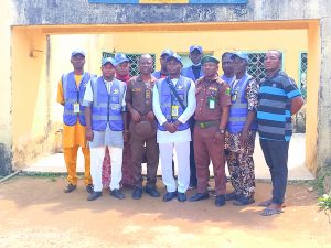 Officers of the Keffi Correctional Center and Members of the Kpuchum Care Initiative in a group photograph.