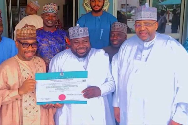 NUC Grants Operational License to Kuje Leadership University Chairman/Board of Trustee (BOT) of the Kuje Leadership University Dr Aliyu Modibbo Umar right, Pro -Chancellor of the University, Dr Musa Yahaya Muhammad and Prof Muhammed Evitu display licence approved by the NUC to commence academic activities at the institution.