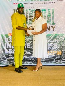 Edo State chapter Chairman of Southern Nigeria Youth Congress,Hon. Comr. Lisa Ebuwa Ohangbon in a group photography with one of the Executive members