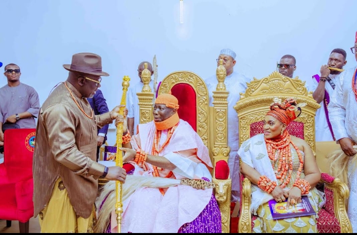 Delta State Governor, Rt. Hon. Sheriff Oborevwori standing while the Asagba of Asaba, His Royal Majesty Obi (Prof.) Epiphany Chigbogu Azinge is seated with his wife