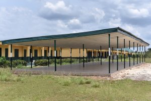 Delta Lands Commissioner Renovates Market, Builds School Pavilion in Igbide Community