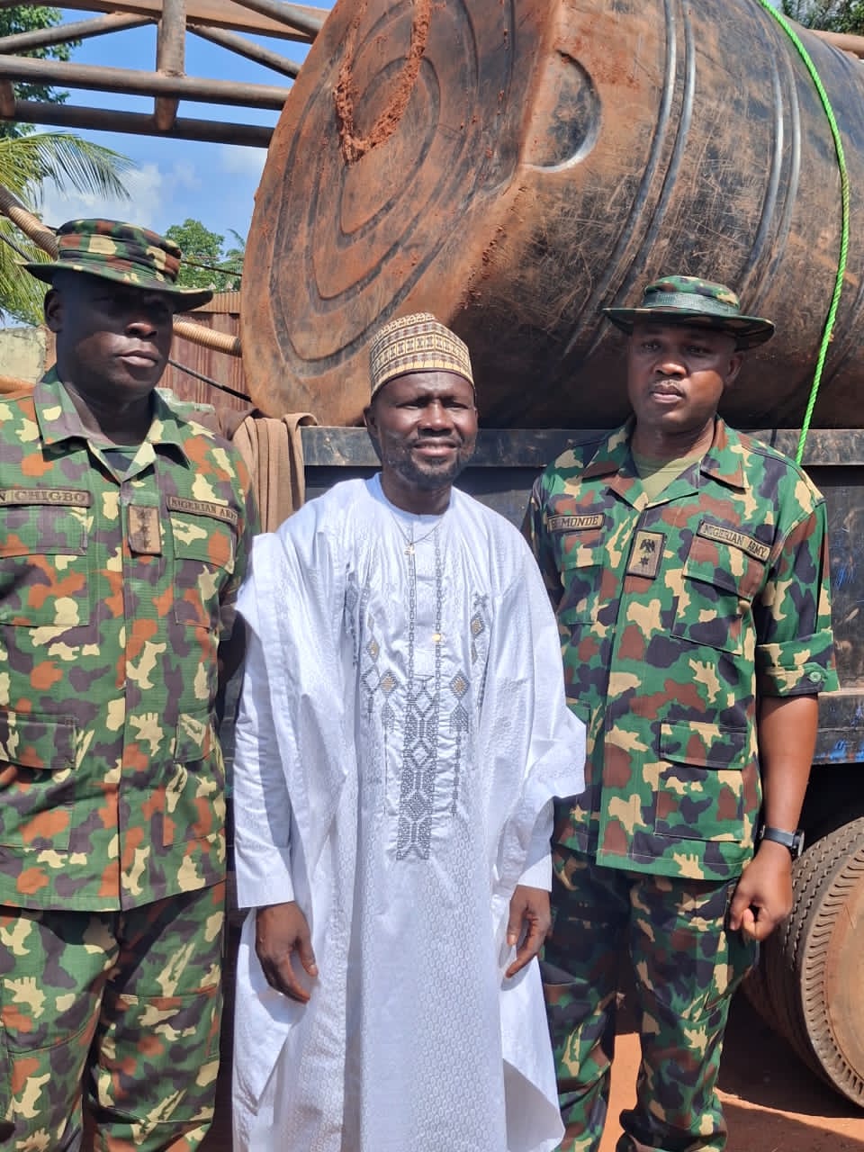 Dr. Joseph Ameh Erico (JAE) (M) in a group photograph with Army Officers