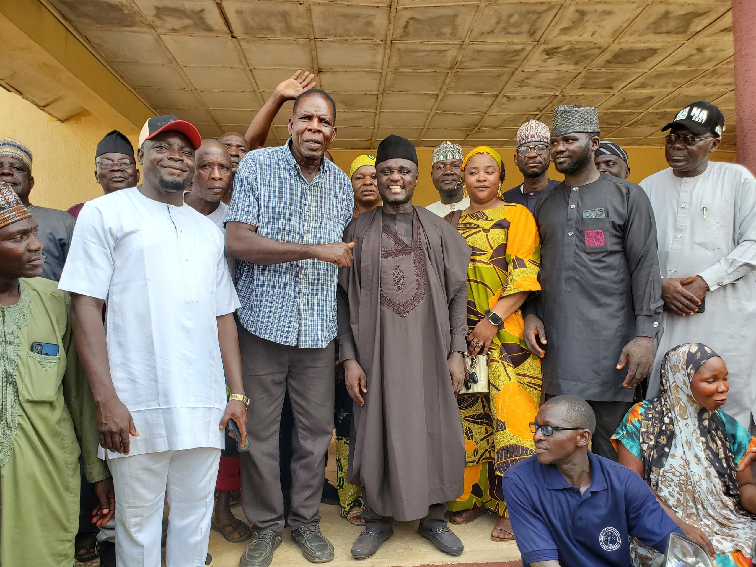 Hon. Joseph Kaura together with his supporters in a group photograph.