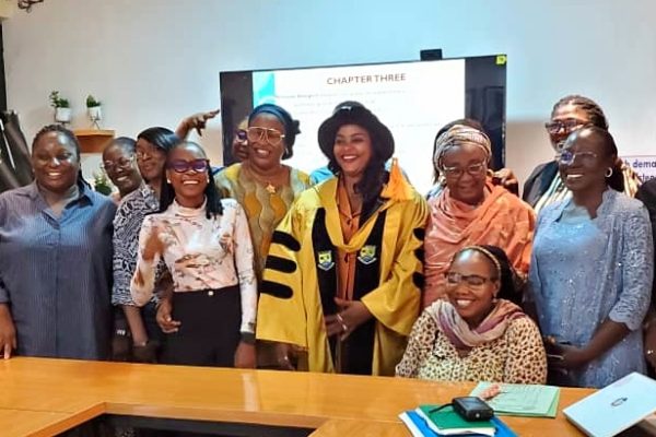 The Director Center for Gender Studies, as well as the Deputies and other Post graduate students in a group photograph.