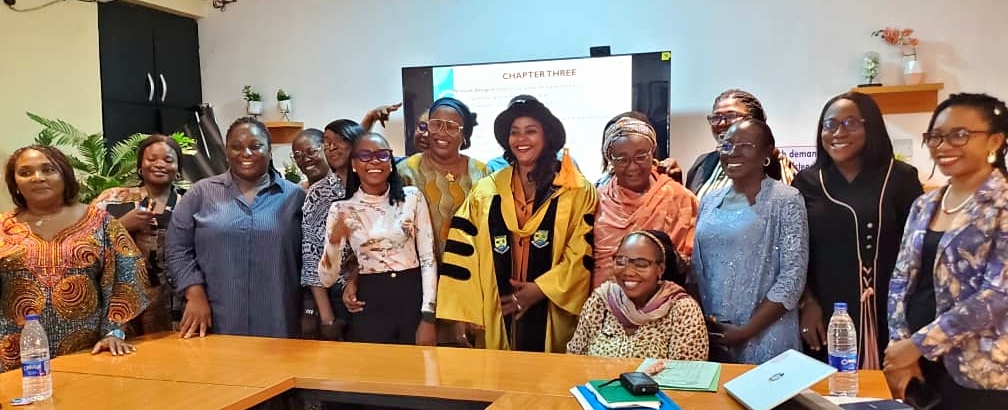The Director Center for Gender Studies, as well as the Deputies and other Post graduate students in a group photograph.