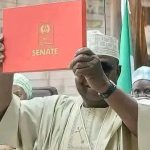 Senator elect, Danladi Envulu Anza while receiving his certificate of return at the INEC headquarters in Abuja.