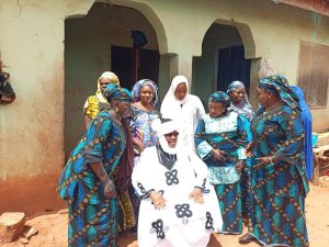 Former President-General of the Egbira Youth Movement (EYM), Abdullahi Kasim Ohizi in group photograph with his family members 