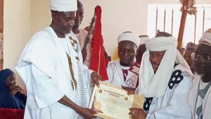 Former President-General of the Egbira Youth Movement (EYM), Abdullahi Kasim Ohizi receiving his chieftaincy certificate 