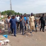 Chairman of Kuje Area Council Hon Samuel Danjuma Shekwolo with environmental officials during inspection of waste evacuation in Kuje on Friday.