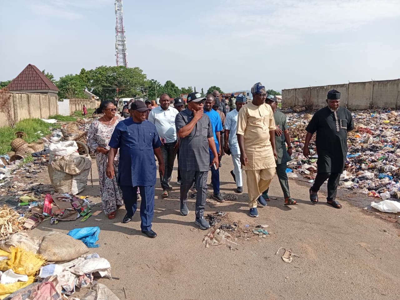 Chairman of Kuje Area Council Hon Samuel Danjuma Shekwolo with environmental officials during inspection of waste evacuation in Kuje on Friday.