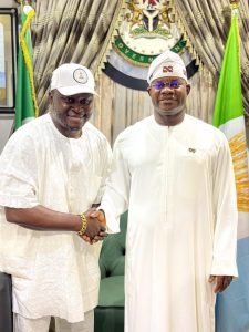 Former Governor of Kogi State, Yahaya Adoza Bello (R), and Director of the City Boy Movement (CBM), Kogi State Chapter, Hon. Ogah Mark Okpanachi (L)