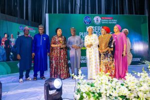 Kogi State Coordinator of the Agro-Climatic Resilience in Semi-Arid Landscapes (ACReSAL) project, Ladi Ahmed Jatto, third left and other awards recipients in Abuja 