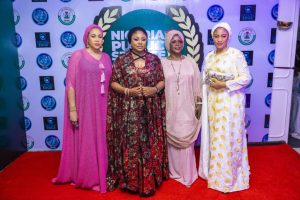 Kogi State Coordinator of the Agro-Climatic Resilience in Semi-Arid Landscapes (ACReSAL) project, Ladi Ahmed Jatto, second left and some women in Abuja 